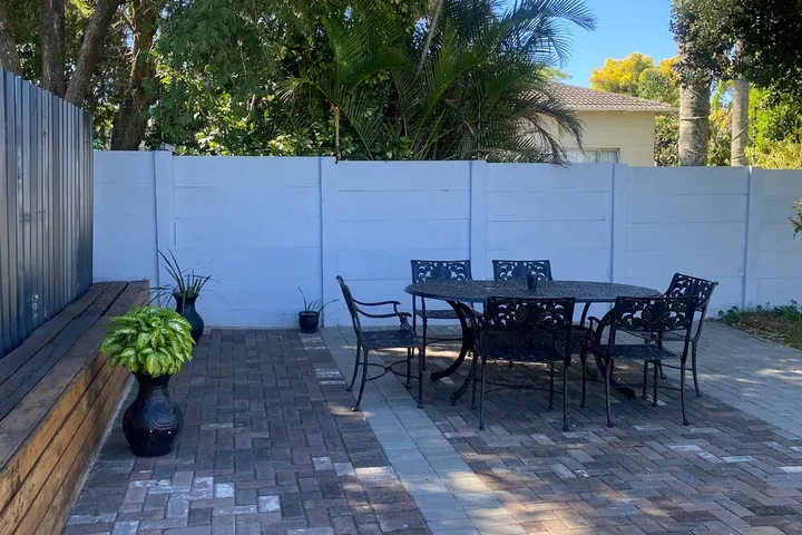 Outdoor seating and garden area at Fusion House