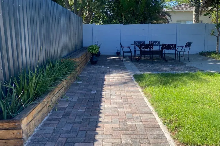 Outdoor seating and garden area at Fusion House